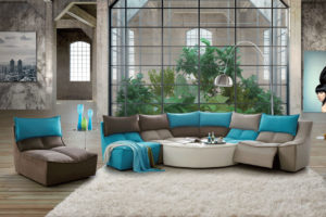 Canapé Modulable HomeSalons bleu, gris et marron dans un salon avec tapis